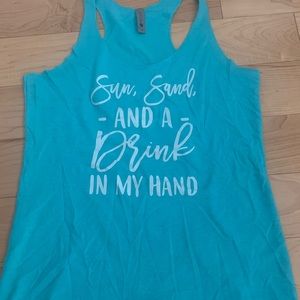 Small Next Level teal tank top